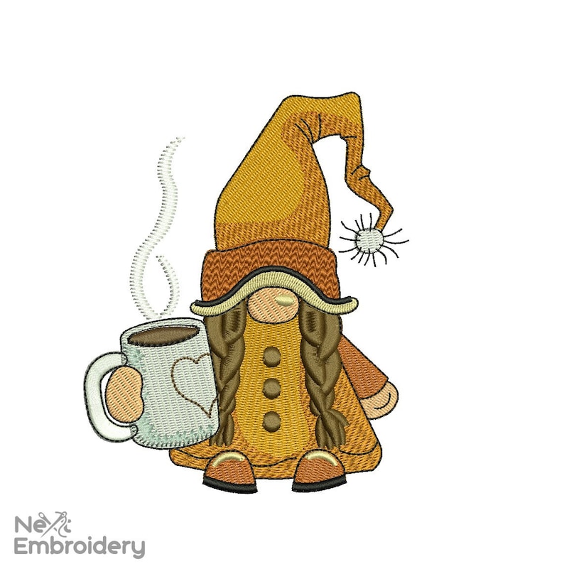 May include: Embroidered design of a gnome holding a coffee mug with steam rising from the mug. The gnome is wearing a brown hat with a yellow brim, a yellow coat, and brown boots. The gnome has brown hair in braids.
