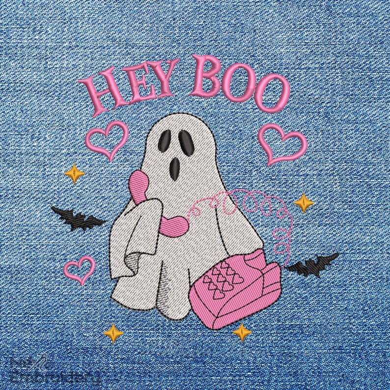 May include: Embroidered design on denim fabric featuring a ghost holding a pink phone, with the text "Hey Boo" above. The design also includes pink hearts and bats.