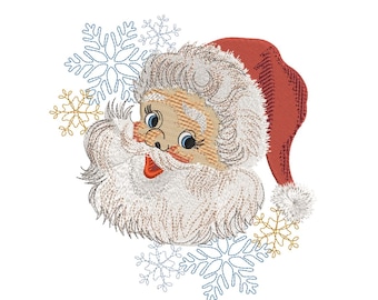 Könnte beinhalten: Stickerei mit dem Gesicht des Weihnachtsmanns mit roter Mütze und weißem Bart, umgeben von Schneeflocken in Blau und Gold.