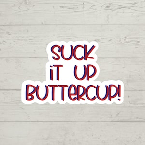 Puede incluir: Pegatina blanca con el texto "SUCK IT UP BUTTERCUP!" en letras rojas y azules con contorno.