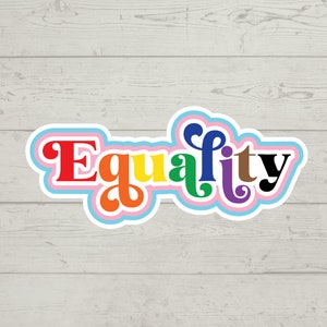 May include: A rainbow-colored sticker with the word "Equality" in a retro font style. The sticker has a white outline and a pink, blue, and light blue border.