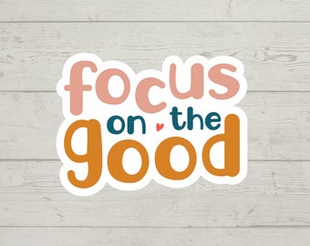 Pegatina de vinilo brillante resistente al agua con el mensaje "Céntrate en lo bueno", bonito regalo para vaso, portátil, botella de agua, regalo de moda.