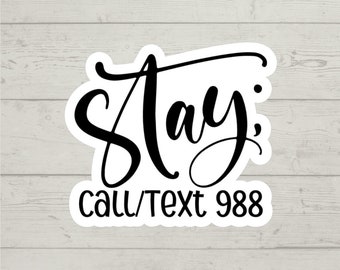 May include: White sticker with black text that reads "Stay, call/text 988".
