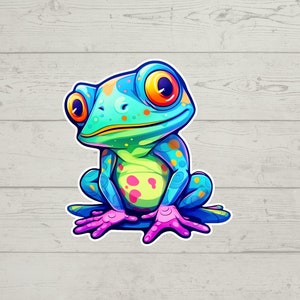 May include: A vibrant blue and green frog with pink toes and yellow eyes. The frog is sitting on a white background.