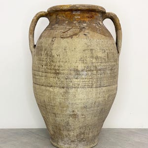 Stor antik rustik kruka med handtag