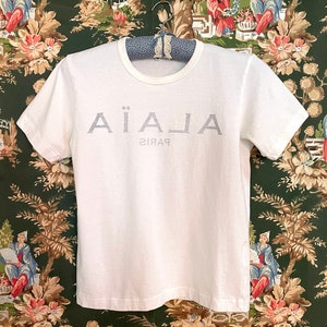 Y2K Vintage Alaia Inside Out Graphic Logo T-Shirt