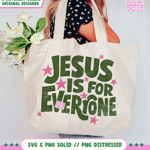 May include: Cream-colored tote bag with the text "JESUS IS FOR EVERYONE" in green, accented with pink stars. The bag has cream-colored handles and is held by a person. The words "SVG & PNG SOLID // PNG DISTRESSED" are at the bottom.