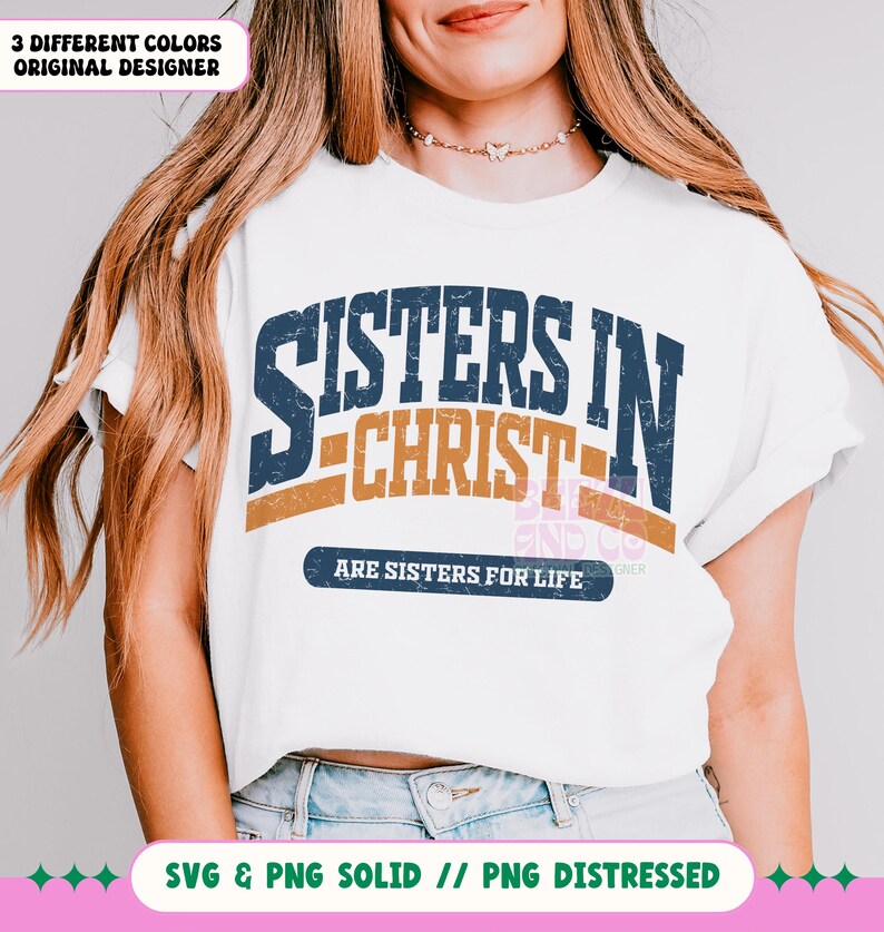 May include: White t-shirt with a blue and orange graphic that says "Sisters in Christ - Are Sisters for Life".