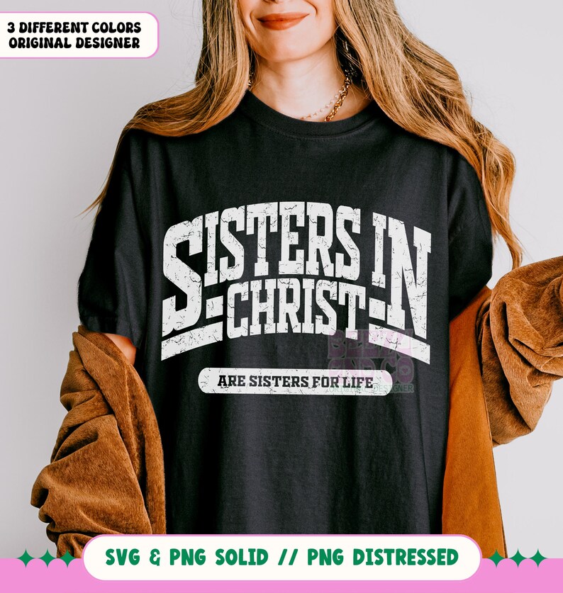 May include: A black t-shirt with white text that reads "Sisters in Christ are sisters for life".