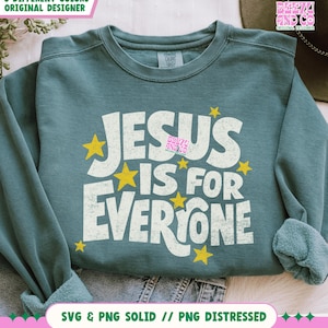May include: Teal-colored sweatshirt with the text "JESUS IS FOR EVERYONE" in white, surrounded by yellow stars. The sweatshirt also has the text "3 DIFFERENT COLORS ORIGINAL DESIGNER" and "SVG & PNG SOLID // PNG DISTRESSED".