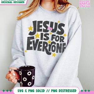 May include: A light gray sweatshirt with the text "JESUS IS FOR EVERYONE" in black, accented with yellow stars. The sweatshirt is paired with a black mug decorated with white flower designs. The image also includes text that says "3 DIFFERENT COLORS ORIGINAL DESIGNER" and "SVG & PNG SOLID // PNG DISTRESSED".