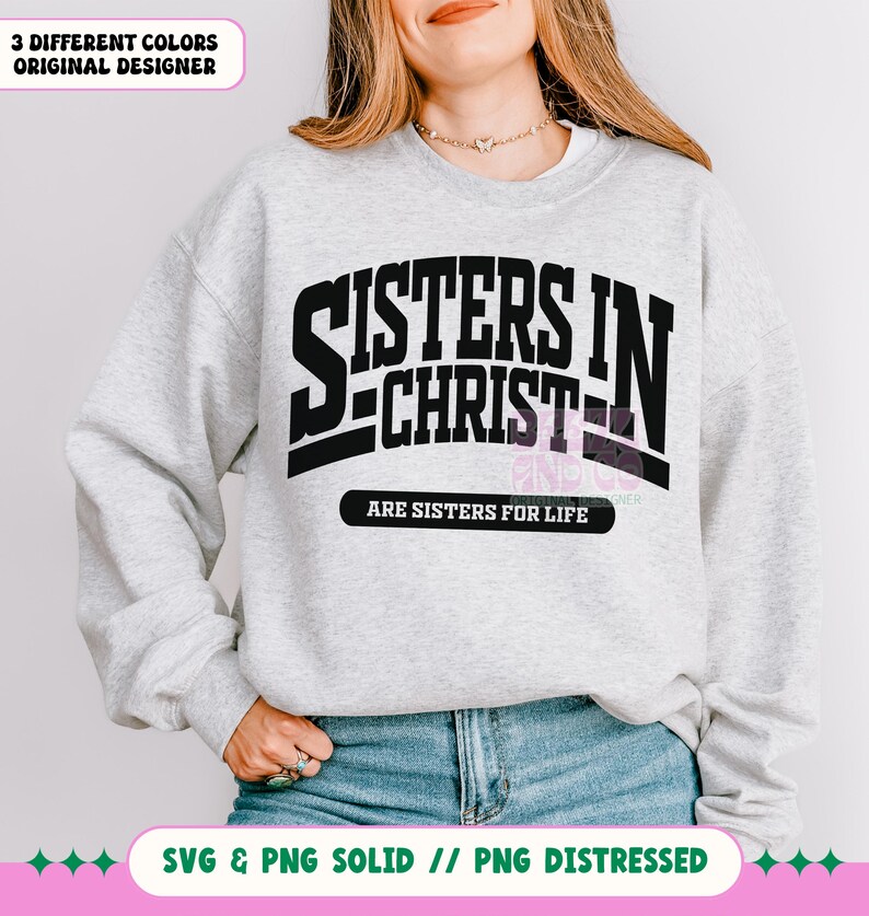 May include: A gray sweatshirt with black text that reads "Sisters in Christ are sisters for life".