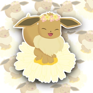 May include: A brown Eevee Pokemon with a yellow flower crown sits on a white daisy with yellow petals. The Eevee is smiling and has closed eyes.