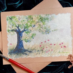 A sturdy oak tree grows in a meadow dotted with lovely purple coneflowers. print of my original watercolor is attached to a rustic brownbag card.