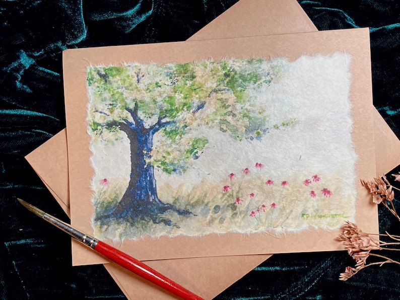 A sturdy oak tree grows in a meadow dotted with lovely purple coneflowers. print of my original watercolor is attached to a rustic brownbag card.