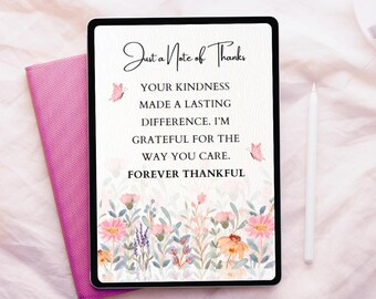 May include: A digital tablet shows a floral design and the text "Just a Note of Thanks." The message includes phrases like "Your kindness made a lasting difference." A pink notebook and a white stylus are also visible.