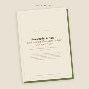 May include: A cream-colored workbook titled Beneath the Surface A Workbook on Show-dont-tell for Fiction Writers by Daelin Creations. The cover features black text on a light background with a dark green border, presenting a clean, structured layout.