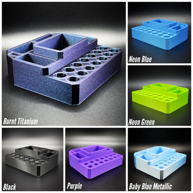 May include: A multi-compartment organizer in various colors, including burnt titanium, neon blue, neon green, black, purple, and baby blue metallic. The organizer features multiple sections and a series of small circular holes, ideal for storing small items.