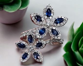 The Frozen Flower Ring, &quot;Floral Sapphire Bypass Ring in Sterling Silver – Marquise Blue Gemstone Petal Design&quot;