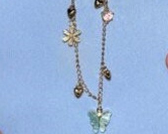 Lover inspired bracelet Blue butterfly gold colored heart charm jewelry with daisy and iridescent heart charms