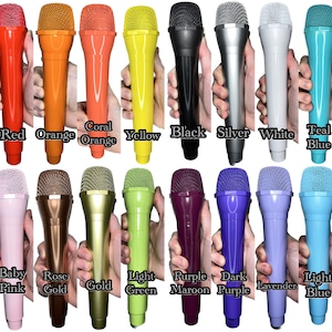 May include: Twenty different colored microphones, each with a black wire mesh grille. The microphones are arranged in two rows of ten, with each microphone labeled with its color.