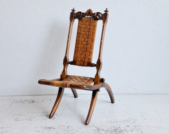 Antieke opvouwbare accentstoel van rotan en hout
