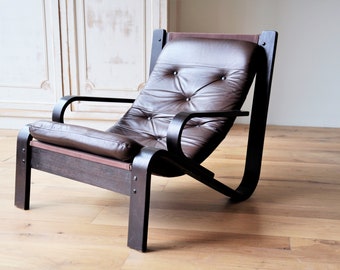 Midcentury lounge chair with a brown wooden frame, Vintage Relax fauteuil