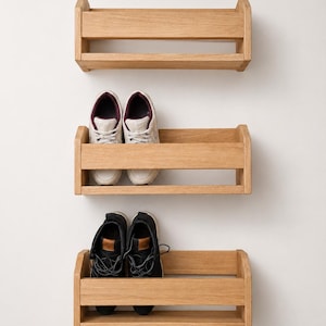 Oak shoe storage shelf for porch areas offering convenient storage for everyday footwear.