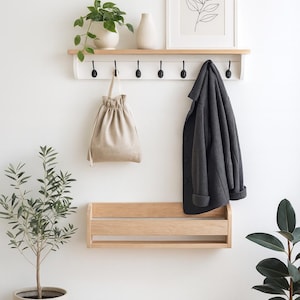 Handmade coat rack with shelf and hooks and matching oak shoe rack – modern wall-mounted entryway storage for coats, bags, and shoes.