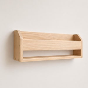Oak shoe rack for hallway organization featuring a clean floating storage design.