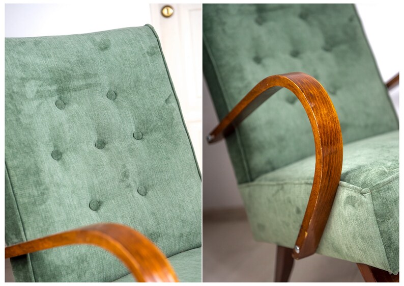 May include: A green velvet armchair with wooden arms. The chair has a tufted back and a buttoned design.