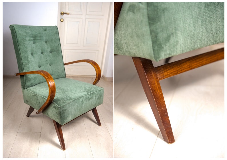 May include: A green velvet armchair with wooden arms and legs. The chair has a tufted back and a simple design.