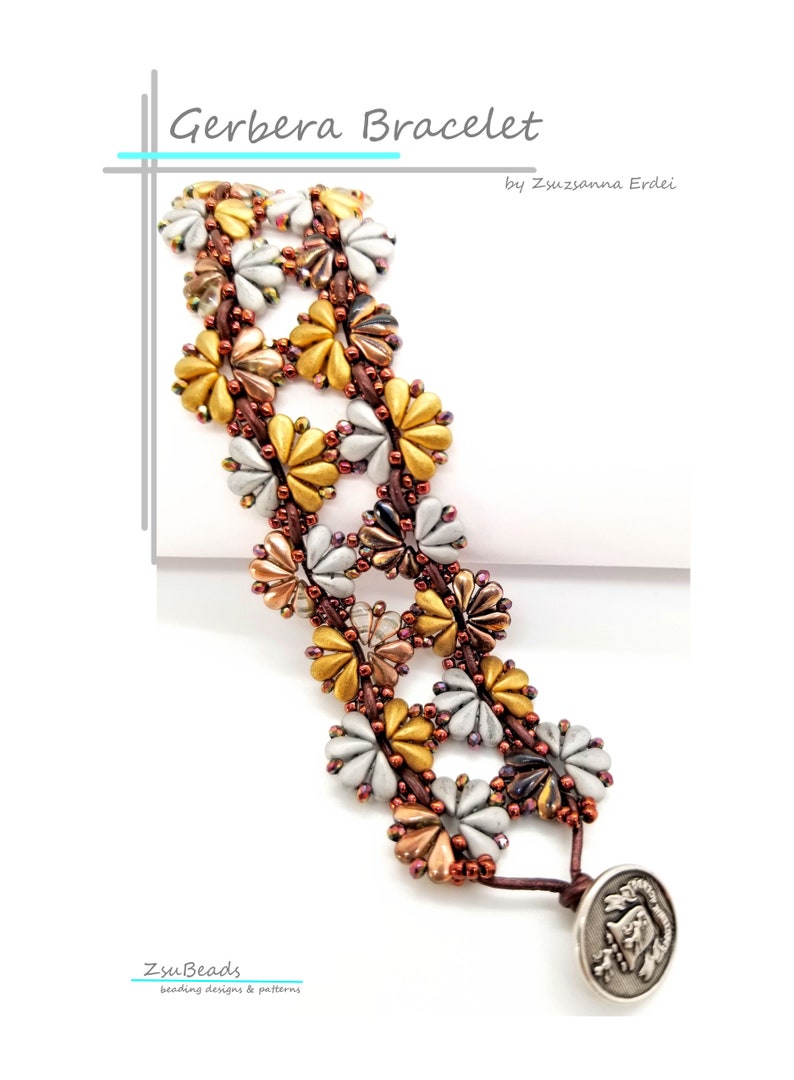 May include: A beaded bracelet featuring a floral design in shades of gold, white, and brown. The bracelet is crafted with seed beads and has a leather cord fastening with a metal clasp. The bracelet is named "Gerbera Bracelet" and is by Zsuzsanna Erdei.