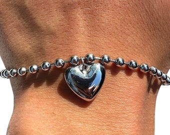 Pulsera de corazón ajustable de acero inoxidable tono plata con dije de corazón abombado y cuentas, regalo para mujer