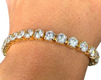 Pulsera de tenis de 19 cm (7,5 pulgadas) con circonita transparente en tono dorado.