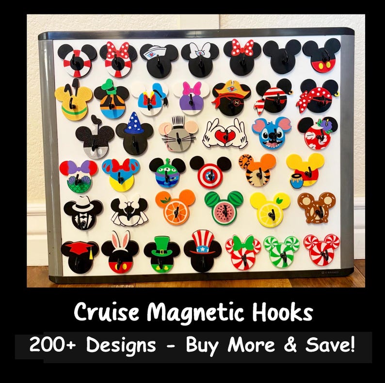 May include: A collection of colorful magnetic hooks in various designs, including Mickey Mouse and Minnie Mouse. The hooks are displayed on a white magnetic board. The text "Cruise Magnetic Hooks" and "200+ Designs - Buy More & Save!" are at the bottom.