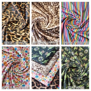 May include: Six different fabric swatches with a variety of patterns. The swatches are arranged in a grid of two rows and three columns. The top row features a beige leopard print, a grey and gold leopard print, and a rainbow striped fabric. The bottom row features a fabric with colorful spots and marbles, a fabric with a leopard print and a green pattern, and a fabric with a black and green pattern featuring a cartoon character.