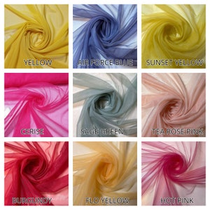 May include: Nine swatches of sheer fabric in various colors, including yellow, blue, pink, green, and red. Each swatch is folded in a circular shape, showcasing the gradient effect of the fabric.