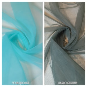 May include: Two swatches of sheer fabric, one turquoise and one camo green.