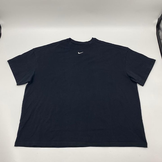 center swoosh nike shirt