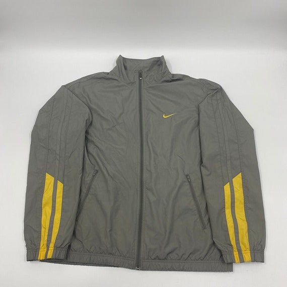 grey and yellow tech fleece