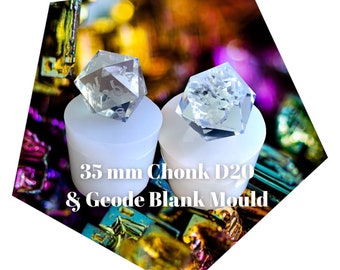 May include: Two clear, 35 mm D20 dice, one with numbers and one blank, are displayed in white silicone molds. The molds are on a colorful, iridescent background.