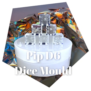 May include: A clear plastic mold for making six-sided dice. The mold is on a white pedestal and there are six clear plastic dice on top of the mold. The dice are arranged in a pyramid shape. The text "Pip D6 Dice Mould" is printed on the pedestal.