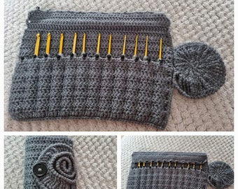 May include: A grey crocheted case with a round crocheted lid, designed to hold crochet hooks. The case has 16 slots for hooks and a button closure.