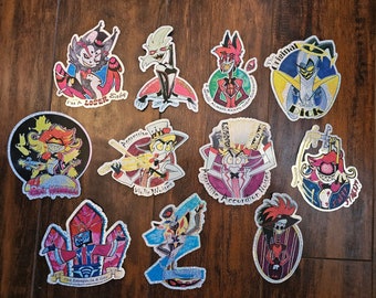 Assorted Hazbin Stickers - Hazbin Hotel, Nifty, Angel Dust, Husk, Alastor, Vinyl, Holographic, Lucifer, Adam, Rosie, Sir Pentious, Vox