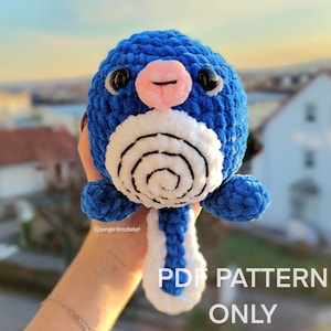 May include: Crochet amigurumi pattern for a blue and white Pokemon character with a swirl pattern on its belly. The pattern is available as a PDF download.  PDF PATTERN ONLY.