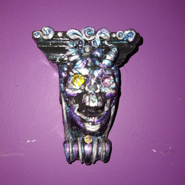 wall sconce, scull