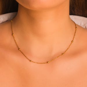 Satellite Necklace: Gold PVD Plated Stainless Steel Beaded Ball Chain