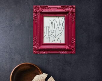 "The Quadrumvirate" in a Magenta Ornate Frame