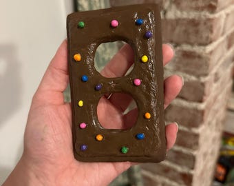 Cosmic Brownie Lichtschalterabdeckung